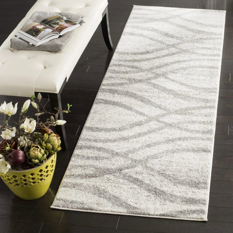 Tapete Adira Brochas Onduladas en Marfil con Gris
