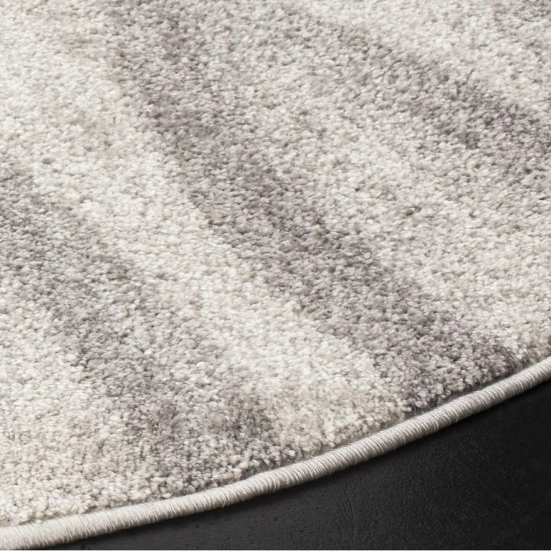 Tapete Adira Brochas Onduladas en Marfil con Gris