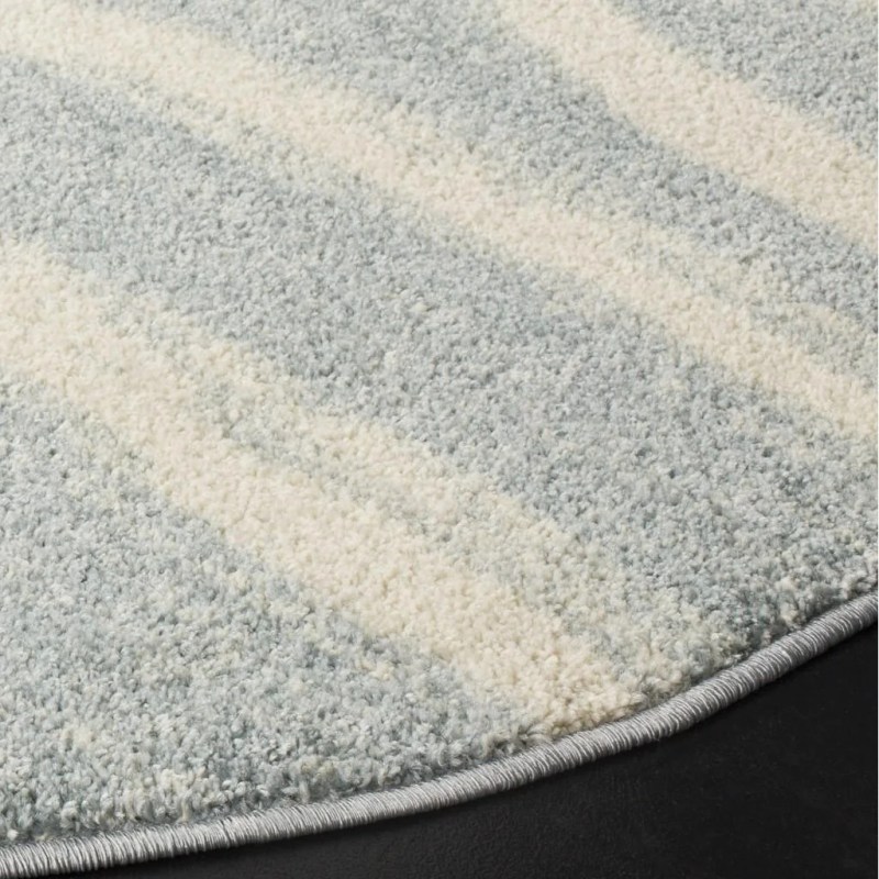 Tapete Adira Brochas Onduladas en Marfil con Gris