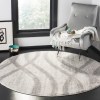 Tapete Adira Brochas Onduladas en Marfil con Gris