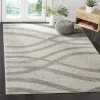 Tapete Adira Brochas Onduladas en Marfil con Gris