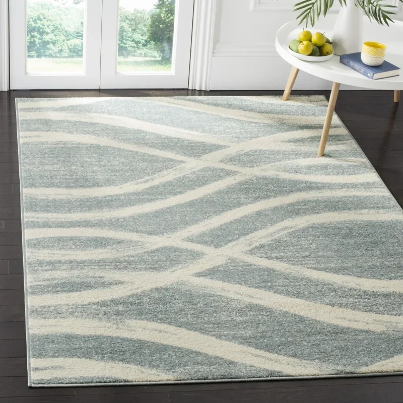 Tapete Adira Brochas Onduladas en Marfil con Gris