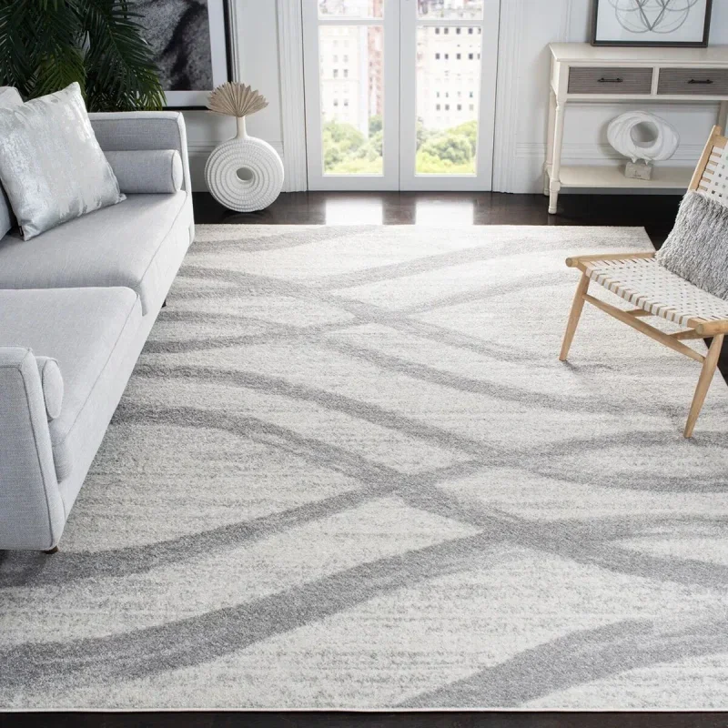 Tapete Adira Brochas Onduladas en Marfil con Gris