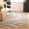 Tapete Adira Brochas Onduladas en Marfil con Gris