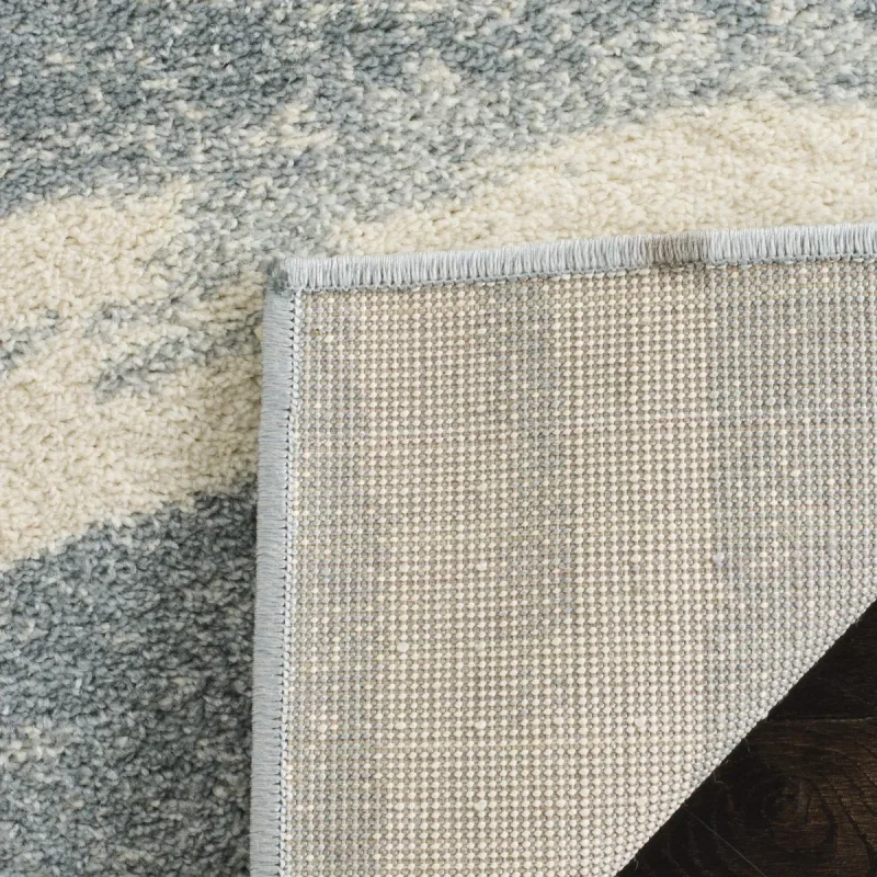 Tapete Adira Brochas Onduladas en Marfil con Gris