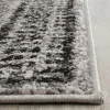 Tapete Adira de Diamantes en Marfil con Gris
