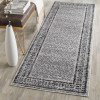 Tapete Adira de Diamantes en Marfil con Gris