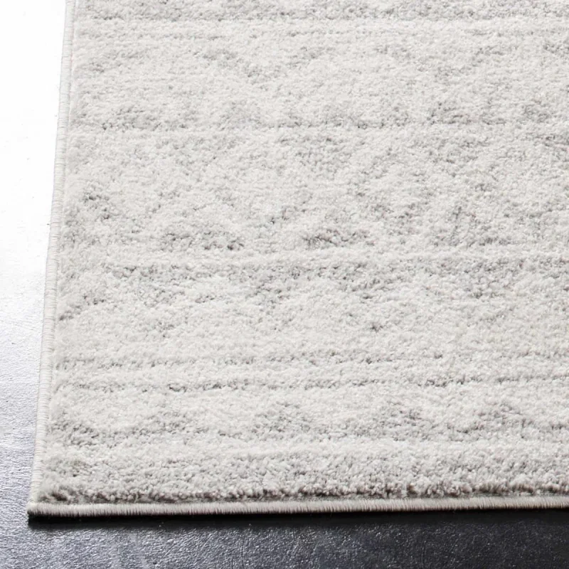 Tapete Adira de Diamantes en Marfil con Gris