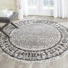 Tapete Adira de Diamantes en Marfil con Gris