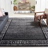Tapete Adira de Diamantes en Negro con Gris
