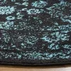 Tapete Adira de Hojas en Negro con Verde Azulado