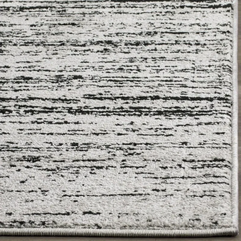 Tapete Adira Desvanecido en Plata y Negro
