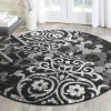 Tapete Adira Floral en Negro con Gris