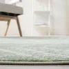 Tapete Adira Geométrico en Verde con Marfil