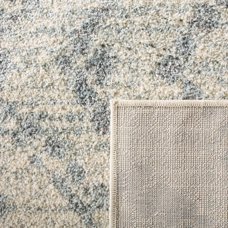 Tapete Adira Moderno en Marfil con Azul