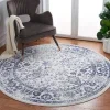 Tapete Adira Vintage en Marfil con Azul Marino
