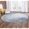 Tapete Adira Vintage Pátina en Gris con Azul