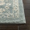 Tapete Adira Vintage Pátina en Gris con Marfil