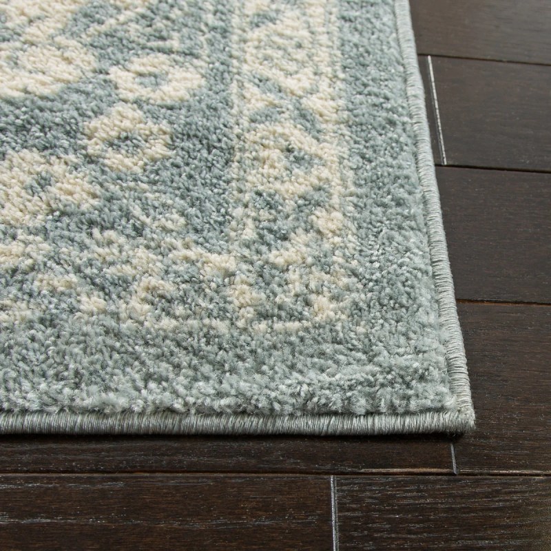 Tapete Adira Vintage Pátina en Gris con Marfil