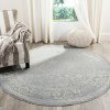 Tapete Adira Vintage Pátina en Gris con Marfil