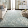 Tapete Adira Vintage Pátina en Gris con Marfil