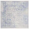 Tapete Adira Vintage Pátina en Marfil con Azul Claro