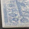 Tapete Adira Vintage Pátina en Marfil con Azul Claro