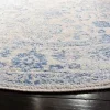 Tapete Adira Vintage Pátina en Marfil con Azul Claro