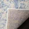 Tapete Adira Vintage Pátina en Marfil con Azul Claro