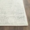 Tapete Adira Vintage Pátina en Marfil con Gris