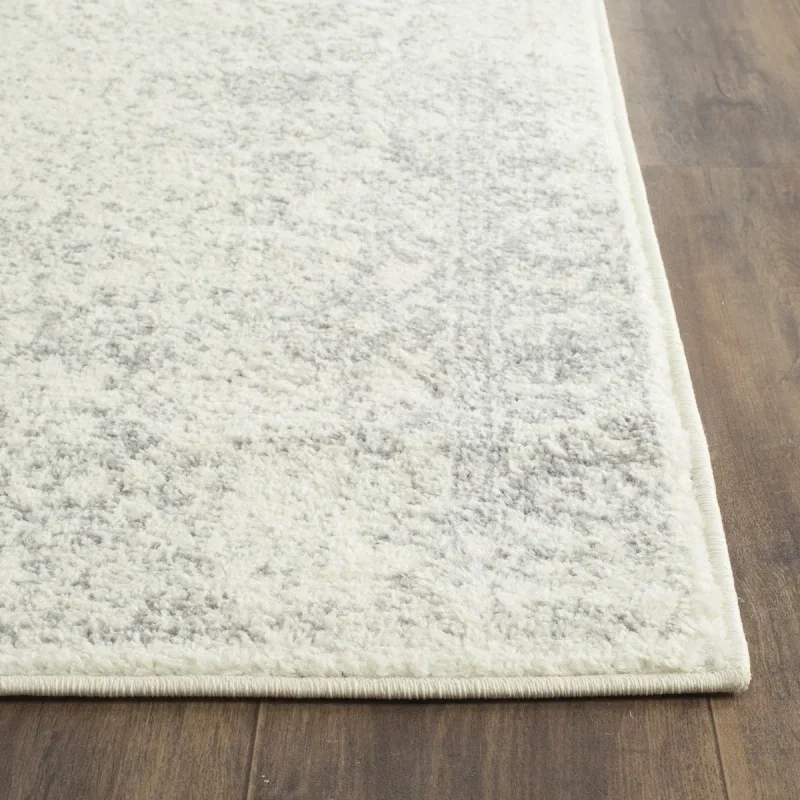Tapete Adira Vintage Pátina en Marfil con Gris