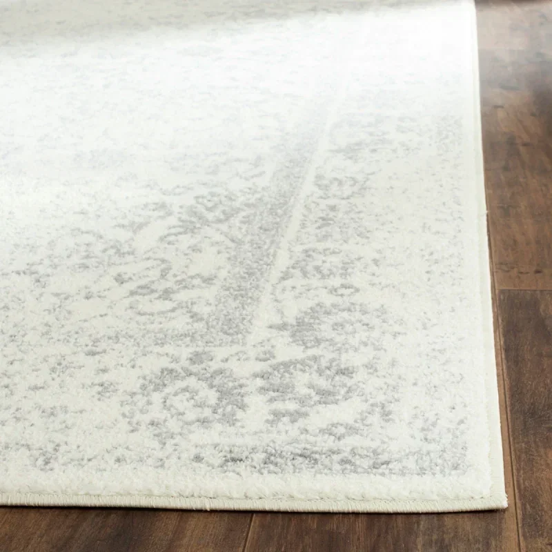 Tapete Adira Vintage Pátina en Marfil con Gris