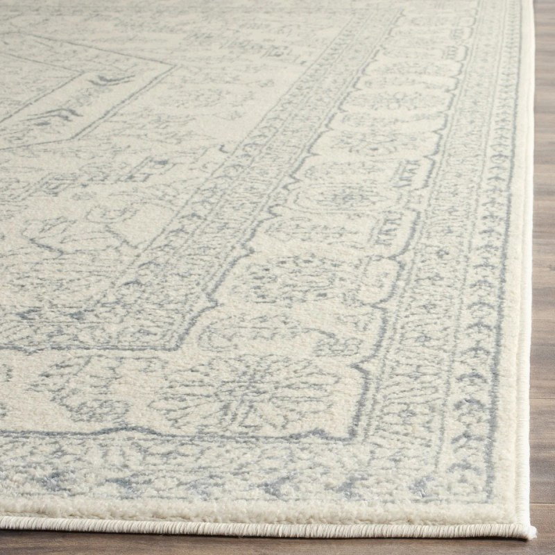 Tapete Adira Vintage Pátina en Marfil con Gris