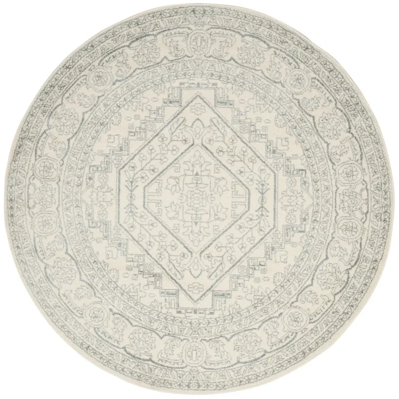 Tapete Adira Vintage Pátina en Marfil con Gris