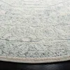 Tapete Adira Vintage Pátina en Marfil con Gris
