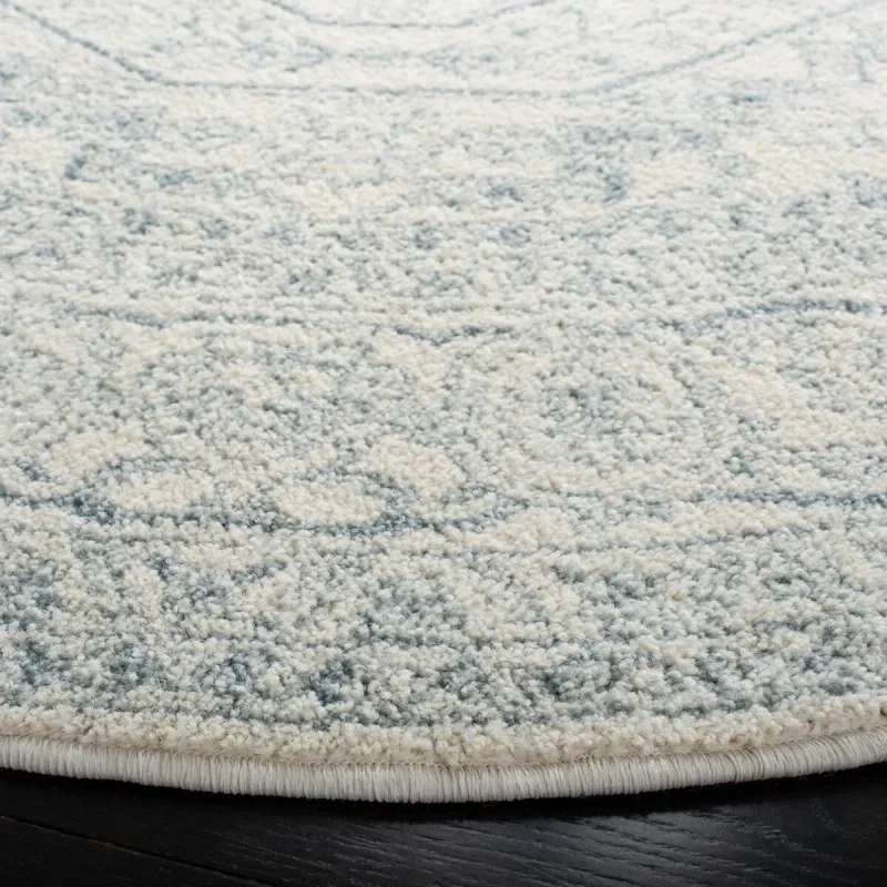 Tapete Adira Vintage Pátina en Marfil con Gris