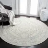 Tapete Adira Vintage Pátina en Marfil con Gris