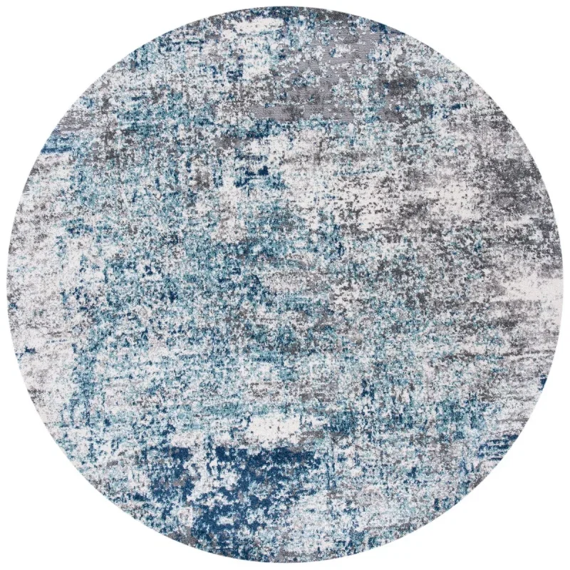 Tapete Astoria Abstracto en Azul Claro con Gris