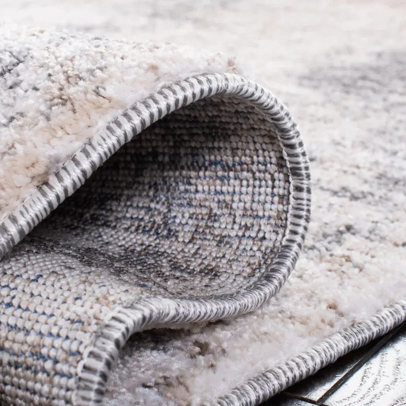 Tapete Astoria de Manchas Nebulosas en Marfil con Gris