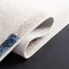 Tapete Bahia de Bloques Geométricos en Marfil con Azul, detalle 3