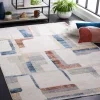 Tapete Bahia de Bloques Geométricos en Marfil con Azul en sala