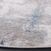 Tapete Bahia de Brochazos Difuminados en Azul con Gris, detalle de la versión redonda
