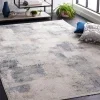 Tapete Bahia de Brochazos Difuminados en Azul con Gris en sala