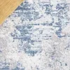 Tapete Emilia Abstracto en Azul con Gris