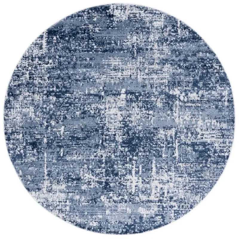 Tapete Emilia de Textura Desgastada en Marfil con Azul