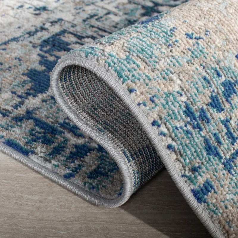 Tapete James de Textura Moteada en Gris con Azul