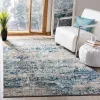 Tapete James de Textura Moteada en Gris con Azul
