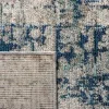 Tapete James de Textura Moteada en Gris con Azul