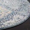 Tapete Memoria Vintage en Azul Claro con Marfil