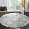 Tapete Memoria Vintage en Azul Claro con Marfil